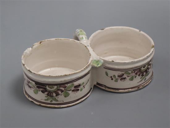 An 18th century tinglaze earthenware twin section stand width 20cm